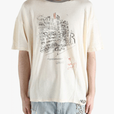 White t-shirt worn by a person, showing the shirt's fit