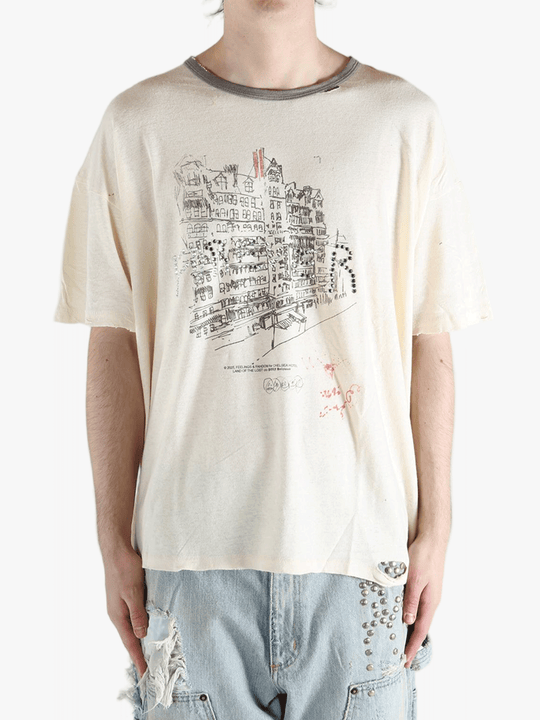 White t-shirt worn by a person, showing the shirt's fit