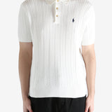 White shirt worn by a person, showing the shirt's fit