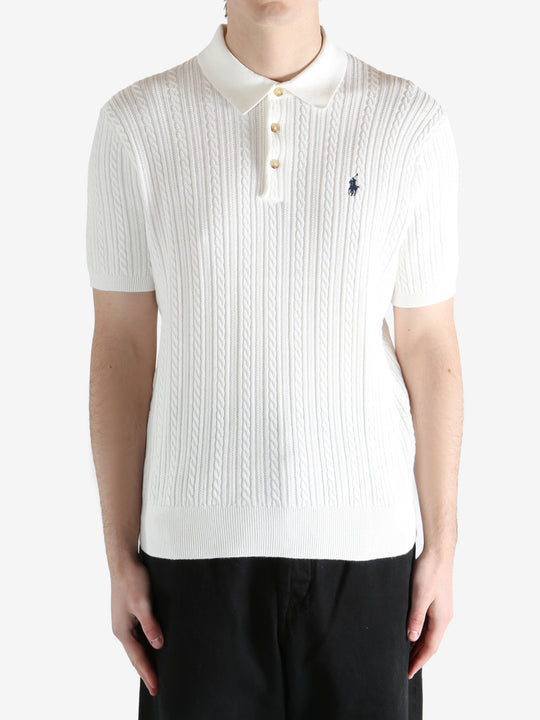 White shirt worn by a person, showing the shirt's fit