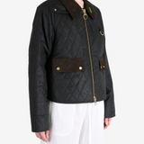 Black jacket worn by a person, showing the jacket fit