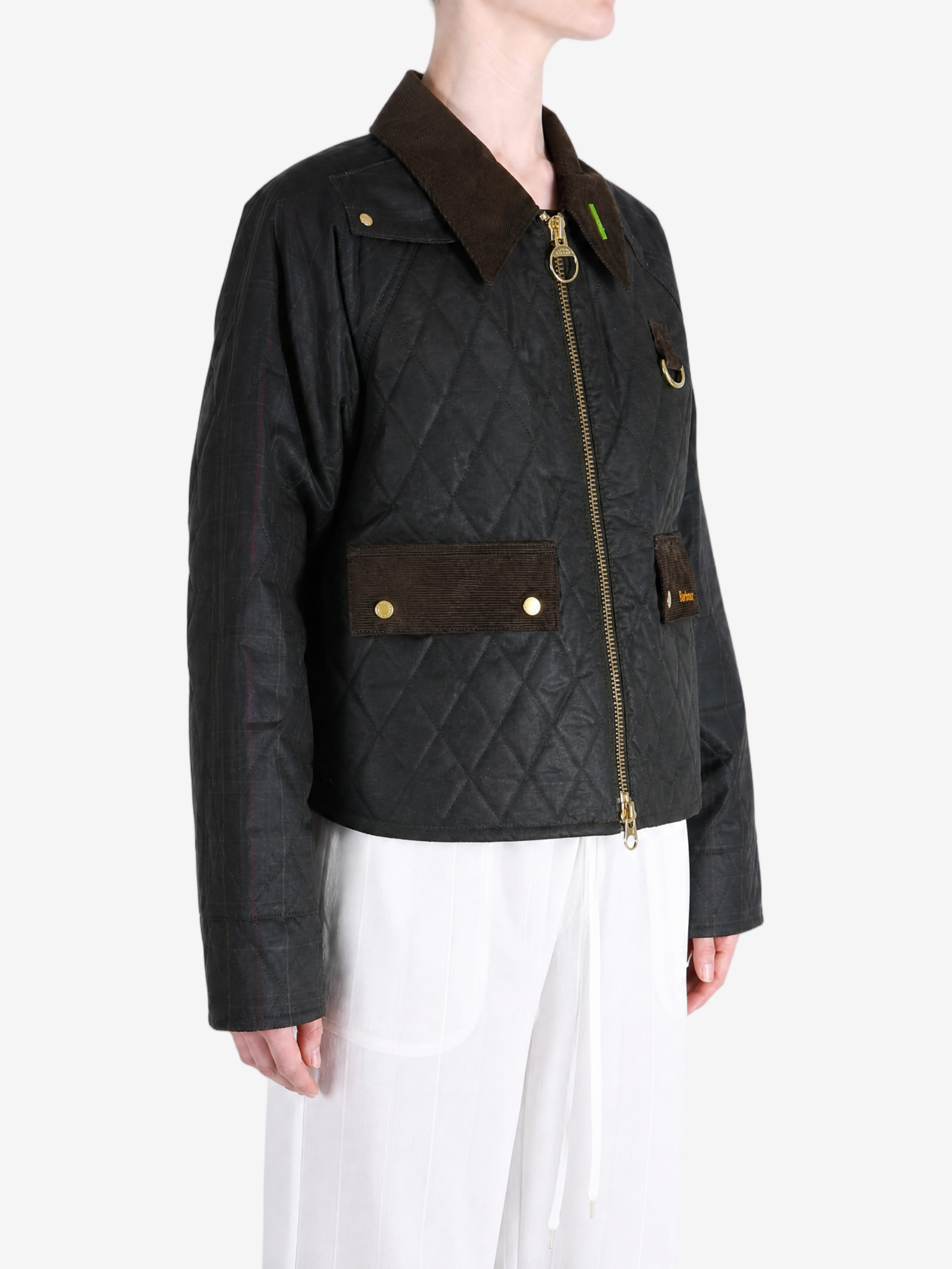 Black jacket worn by a person, showing the jacket fit