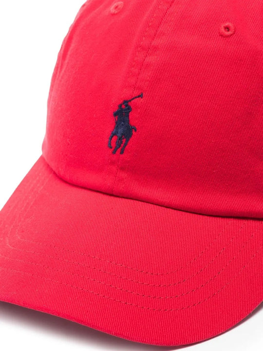 Close up of the red hat, showing texture of the cotton fabric