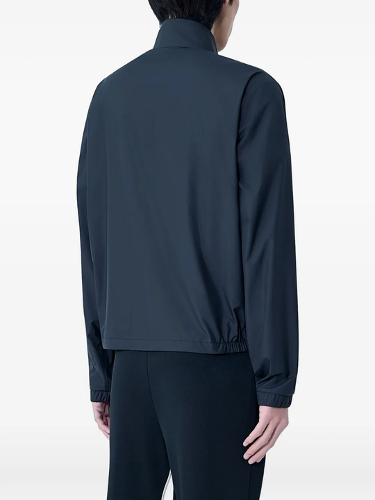 blue jackets-coats worn by a person,show the jackets-coats fit