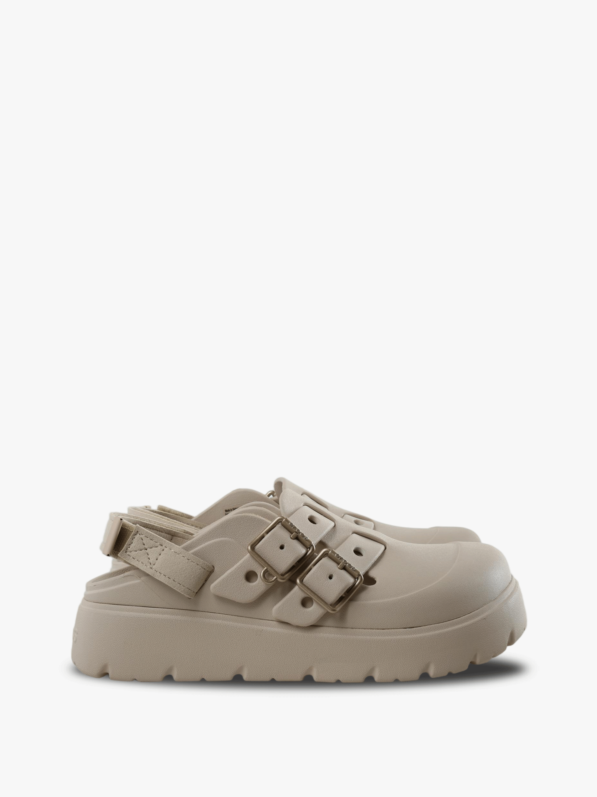 Tan shoes, side view