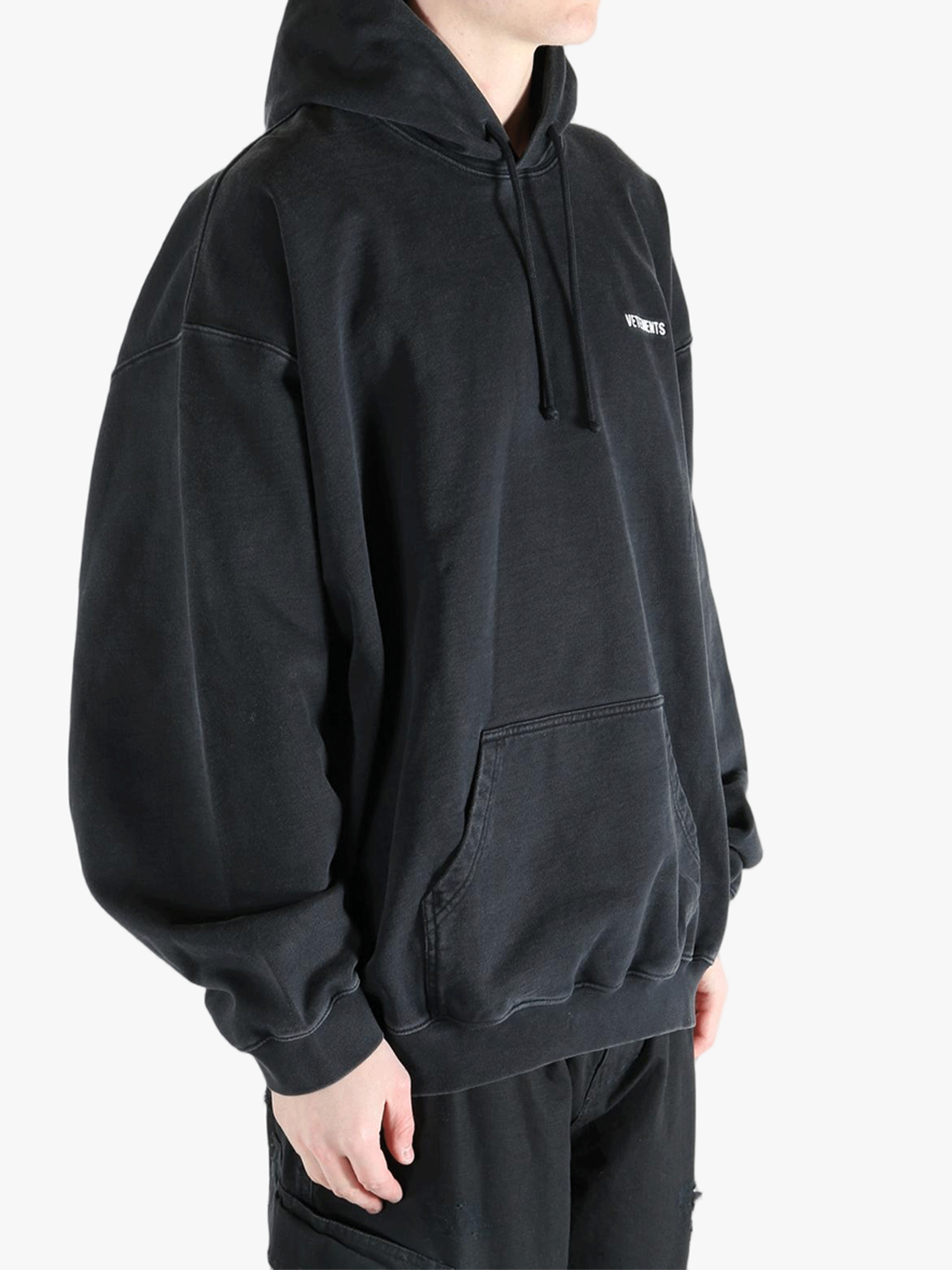 Black sweats-hoodies worn by a person, showing the fit