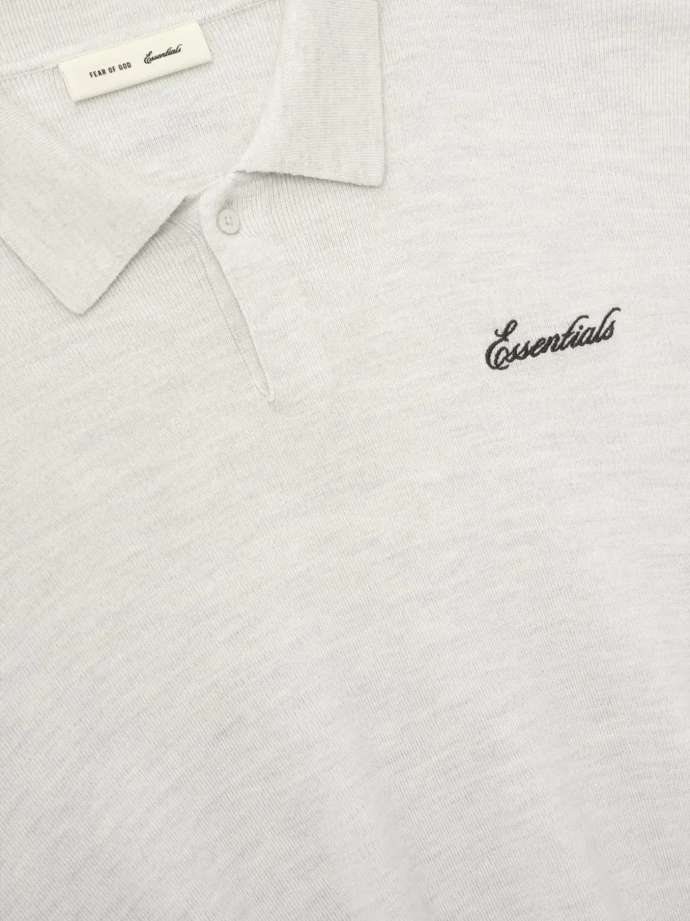 Close up of white polo shirt,showing texture of the wool fabric