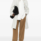 Yellow pant  worn by a person, showing the pant's fit