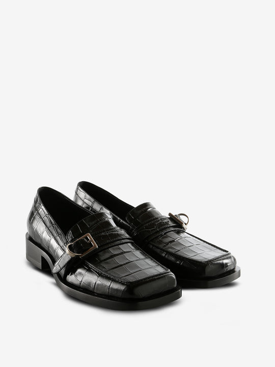 Black loafers, side view