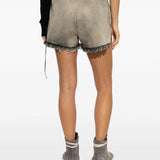 Grey shorts worn by a person, showing the shorts fit