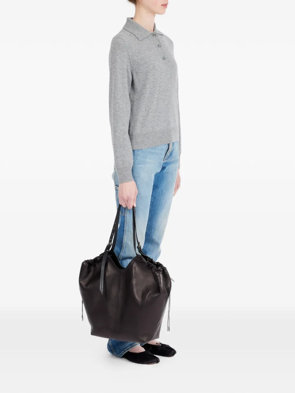 Black bag worn by a person, showing the bag fit