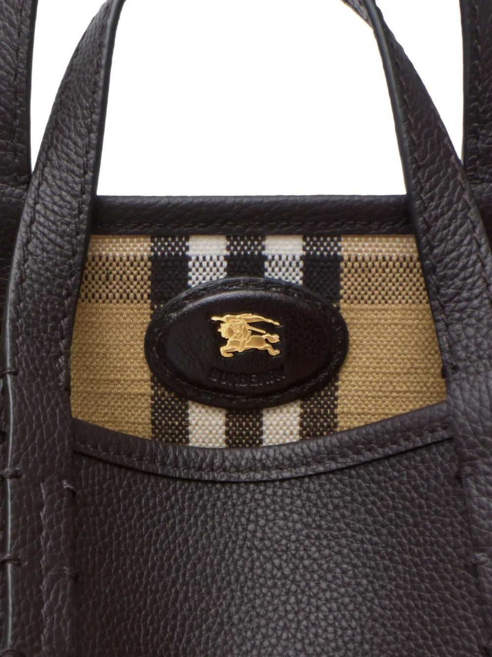 Close up of tan bags, showing texture of the calf leather fabric