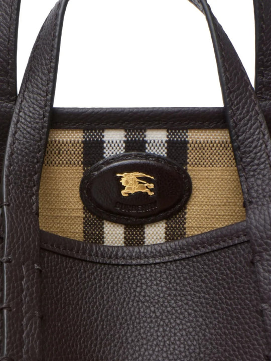 Close up of tan bags, showing texture of the calf leather fabric
