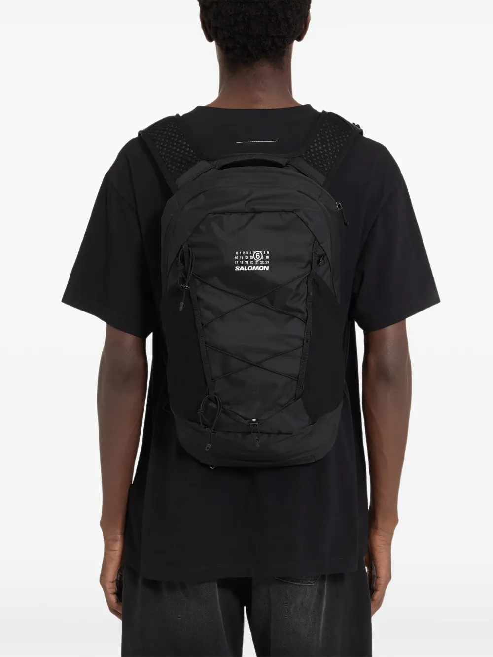 Black bag worn by a person, showing the bag fit