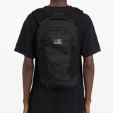 Black bag worn by a person, showing the bag fit