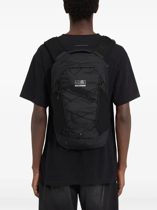 Black bag worn by a person, showing the bag fit