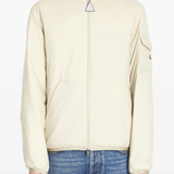 tan jacket worn by a person, showing the jacket fit