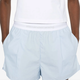 Close up of blue short,showing texture of the cotton fabric.