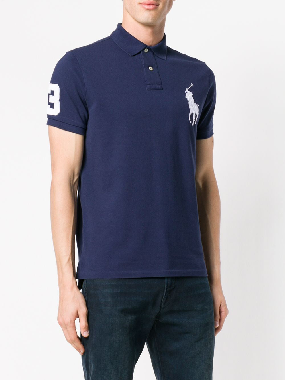 Navy T-shirt worn by a person, showing the shirt's fit
