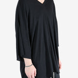 Black t-shirt worn by a person, showing the t-shirt fit