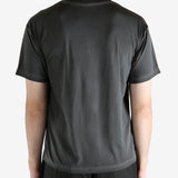 Black t-shirt worn by a person, showing the shirt's fit