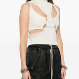 White top worn by a person, showing the top's fit