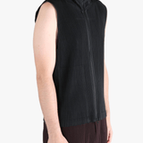 Black vest worn by a person, showing the vests fit