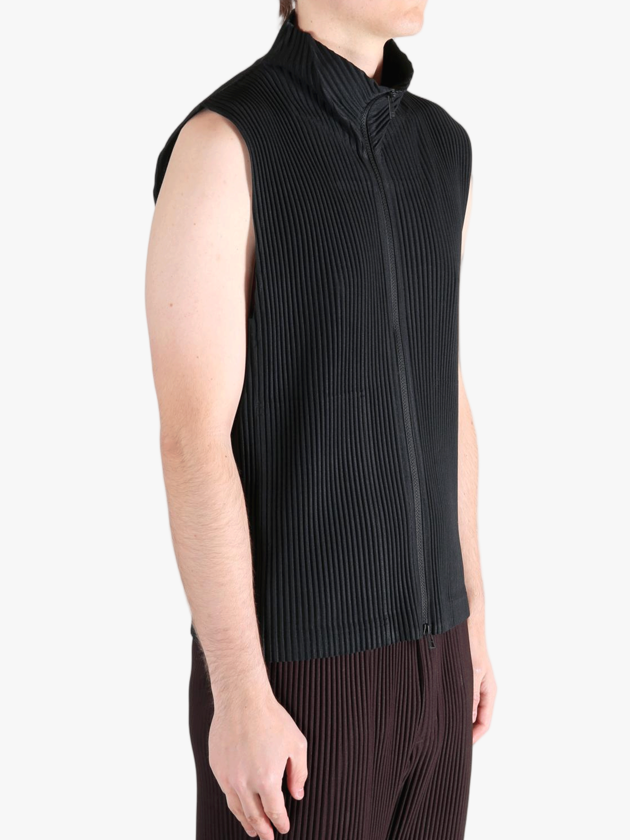 Black vest worn by a person, showing the vests fit