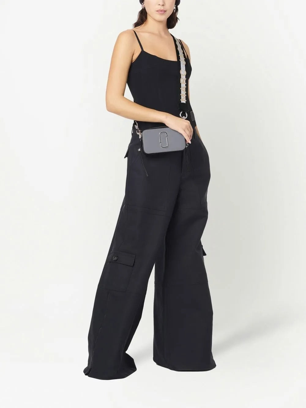 Grey bag worn by a person, showing the bag's fit