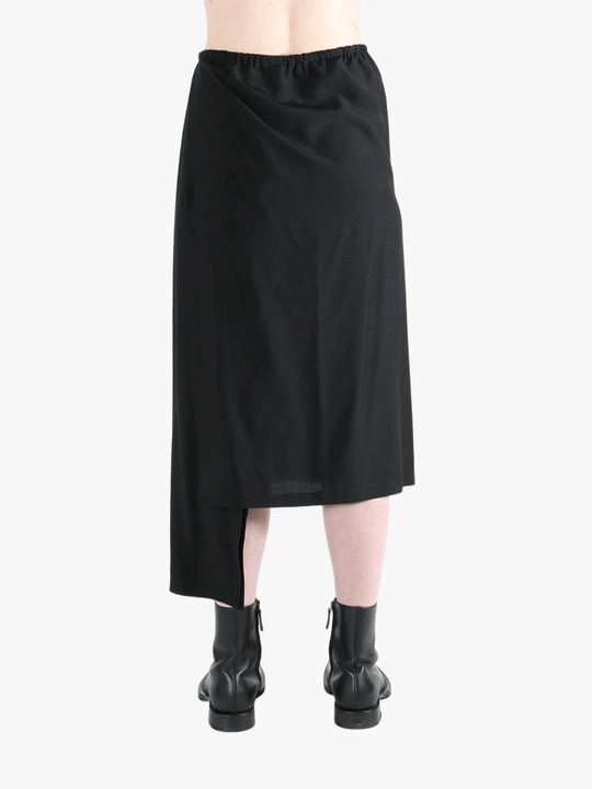 Black skirt worn by a person, showing the skirt fit