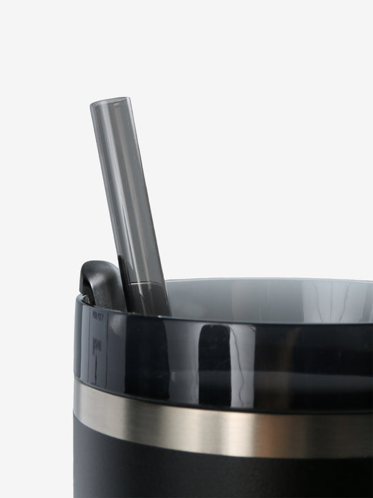 Close up of black tumbler, showing texture of the stainless steel fabric