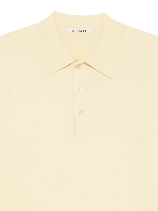 Close up of yellow T-shirts, showing texture of the cotton fabric