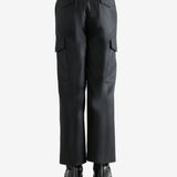 Black pant worn by a person, showing the pant's fit