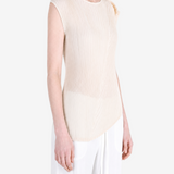 Tan shirt worn by a person, showing the shirt fit