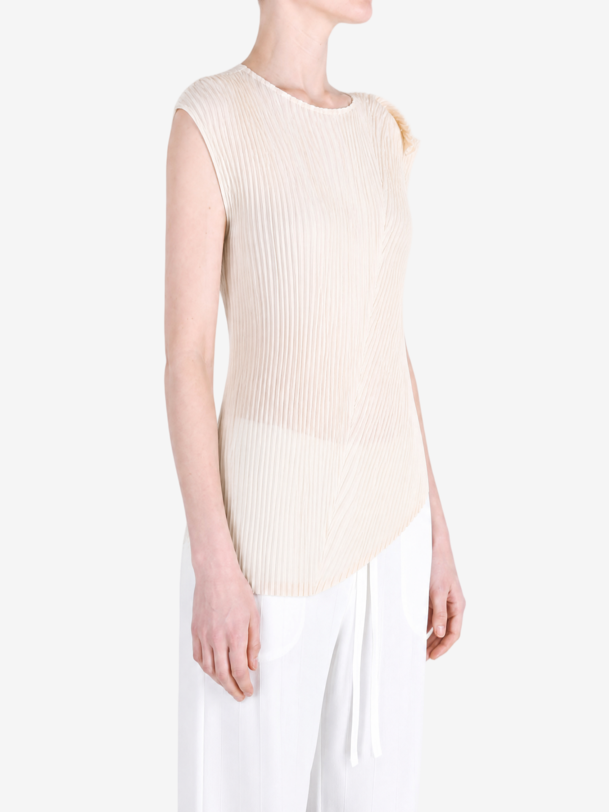 Tan shirt worn by a person, showing the shirt fit