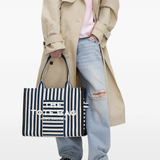 Blue bag worn by a person, showing the bag's fit