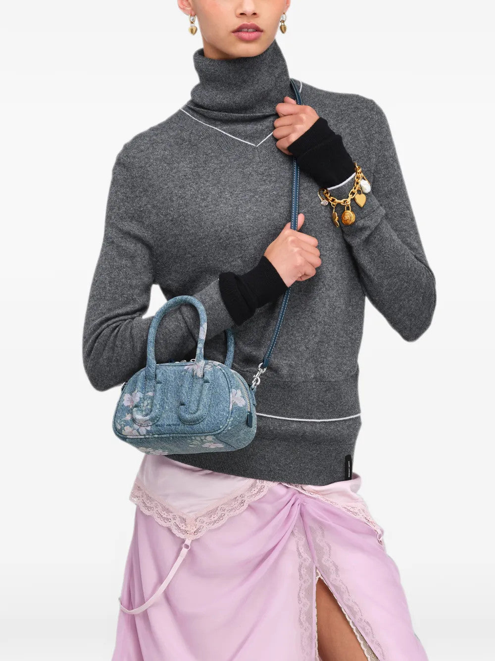 Blue bag worn by a person, showing the bag fit