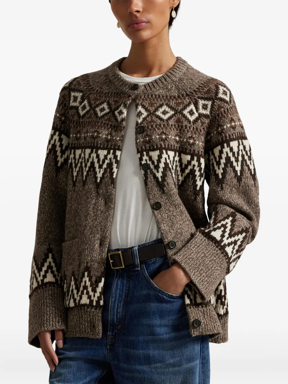 Brown knitwear worn by a person, showing the knitwear's fit