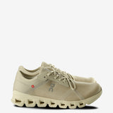 Tan sneakers, front view