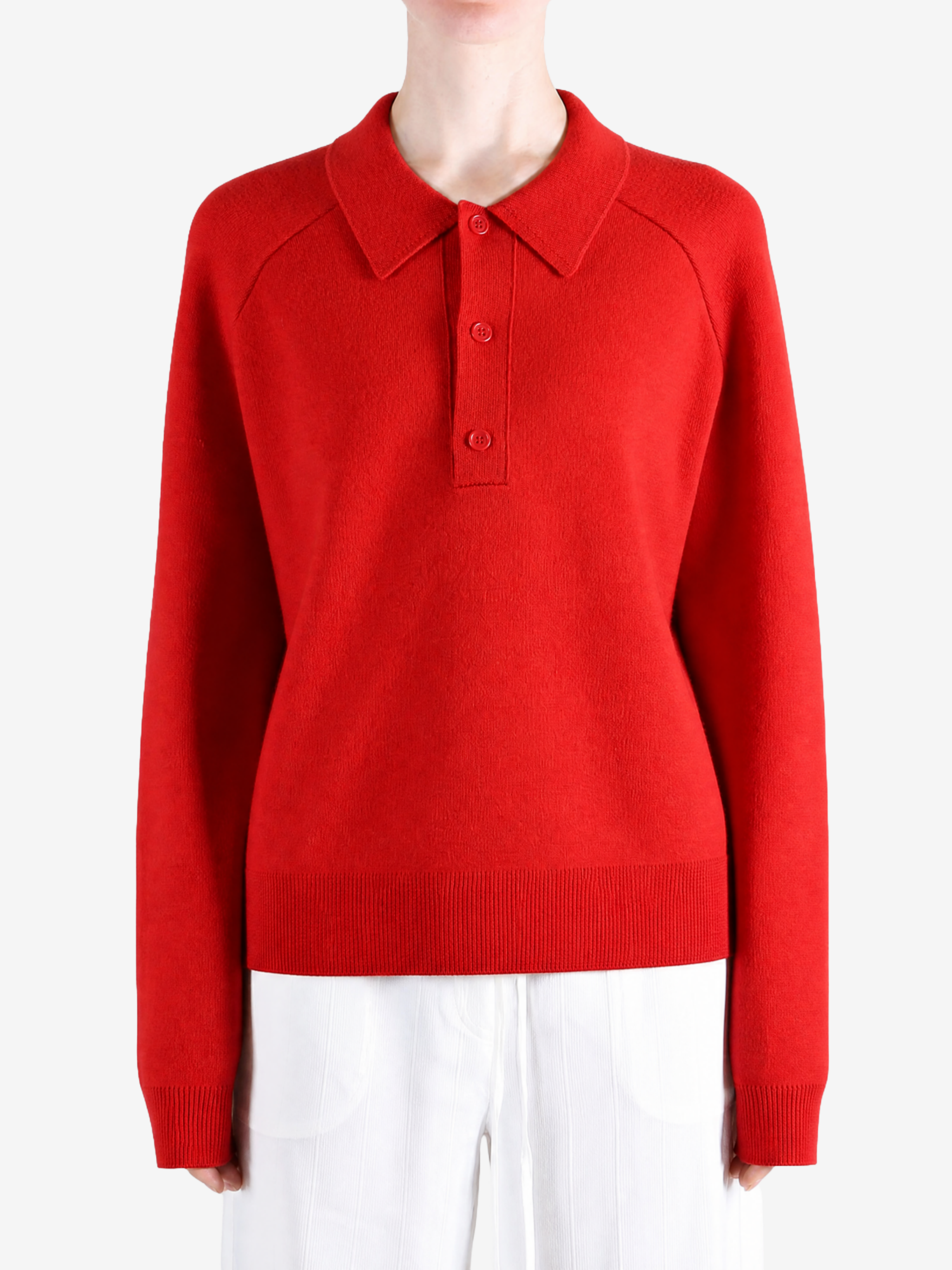 Red shirt worn by a person, showing the shirt fit