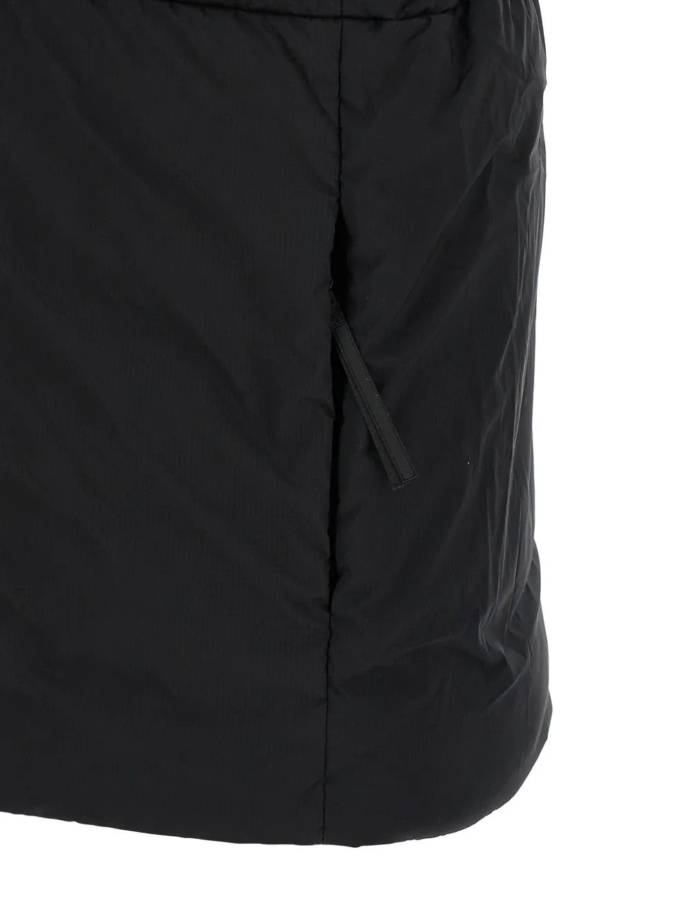 Close up of Black jacket, showing texture of the 100% polyamide fabric