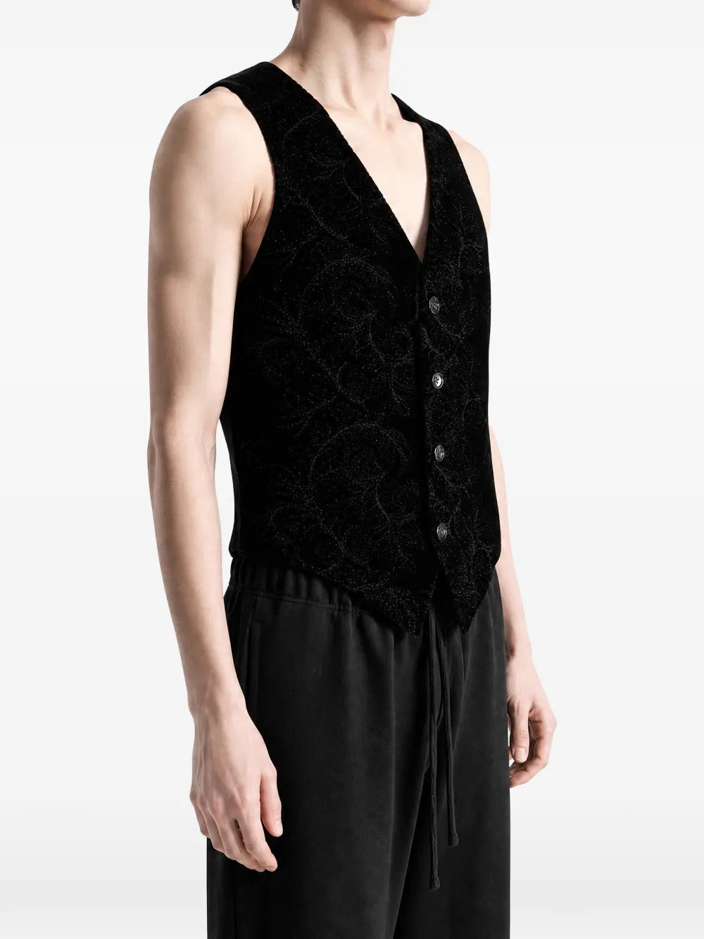Black jacket worn by a person, showing the jacket fit