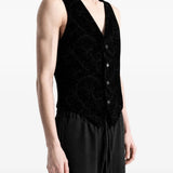Black jacket worn by a person, showing the jacket fit