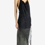 Black top worn by a person, showing the top's fit