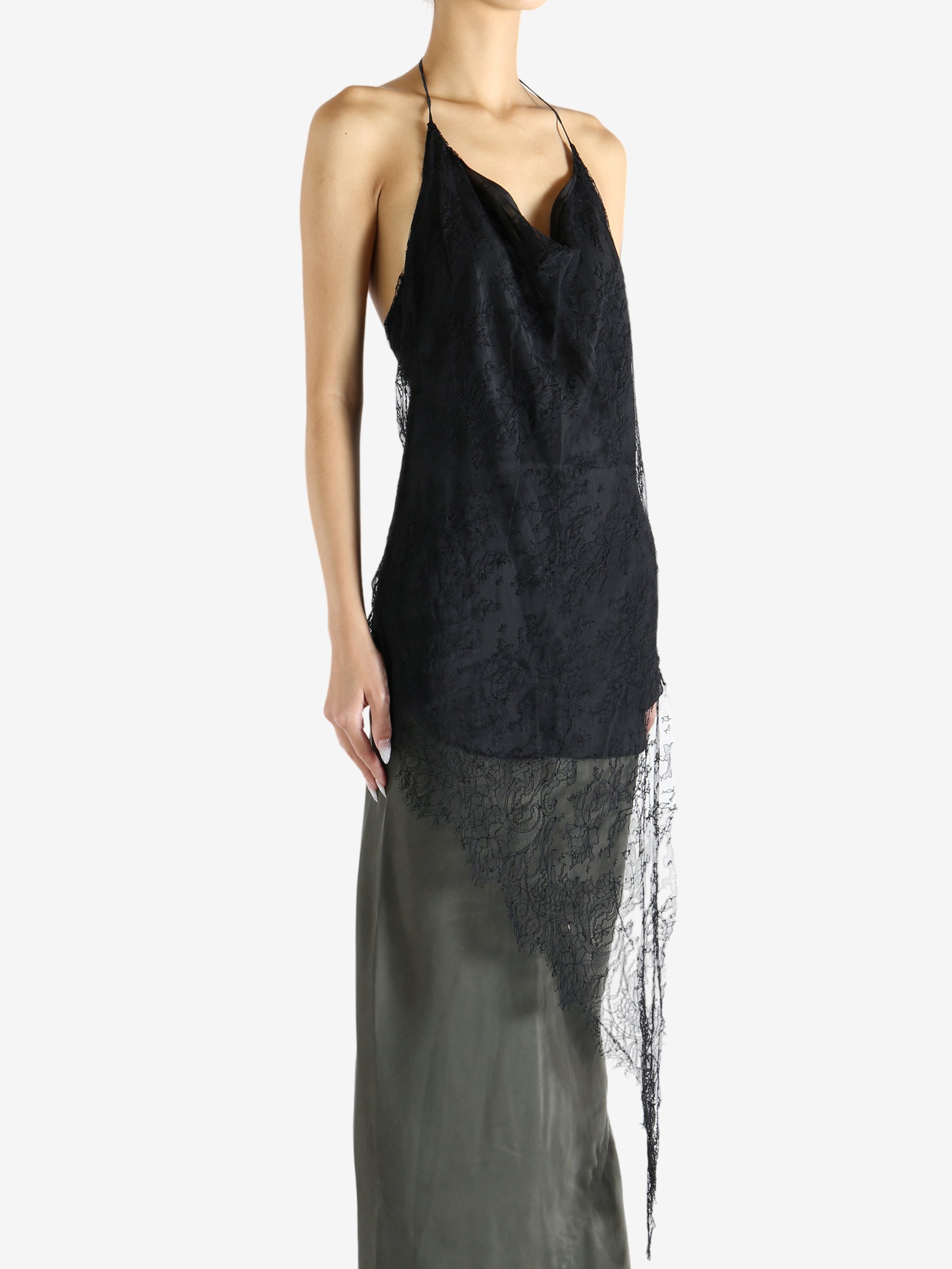 Black top worn by a person, showing the top's fit