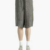 Blue pants worn by a person, showing the pants' fit