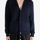 Navy cardigan worn by a person, showing the cardigan's fit