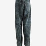 Blue jeans worn by a person, showing the jeans fit