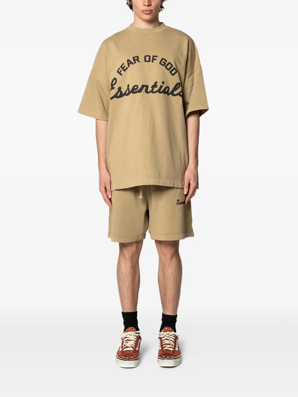 Tan shorts, full body view