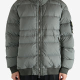 Grey jacket worn by a person, showing the jacket's fit